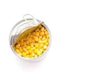 canned corn on a white background, open tin can, food preservation, space for text, close-up