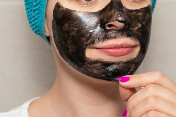 Black charcoal peel off face mask