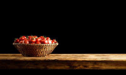 Desk of free space and fresh red tomatoes. 