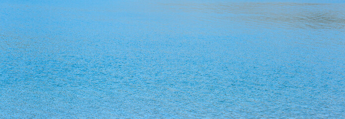 Fototapeta na wymiar texture of blue water with waves surface background