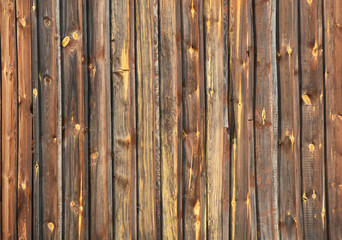 Fototapeta premium Brown vintage wooden knotty boards background.