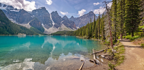 Moraine lake shoreline trail near Lake Louise village in Banff National Park, Alberta, Rocky Mountains, Canada