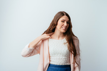 long-haired beautiful brunette girl in hot sweater, isolated on white background