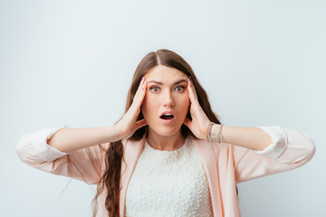 Shocked lady, long-haired beautiful young brunette woman surprised problem