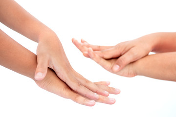 During the coronavirus epidemic mother teaches children to wash their hands with alcohol gel isolated on white background.