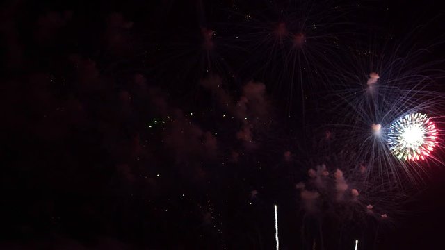 Colourful Firework display on a black sky, during new Year's Eve in Pattaya city, Thailand.
