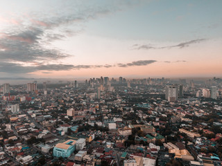 Fototapeta na wymiar Aerial Landscape shot of Metro Manila in the Philippines while sunrise
