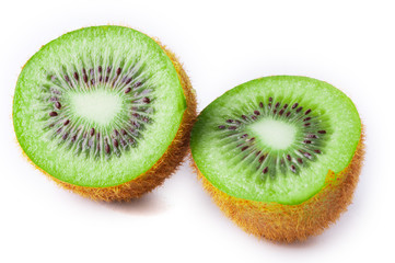 Halves of kiwi on a white background. Isolated fresh fruit of green color