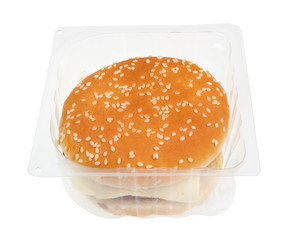 Cheap  tasteless hamburger with cutlet cheese and ketchup  in plastic container box