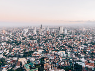 Fototapeta na wymiar Aerial Cityscape of Metro Manila while sunrise