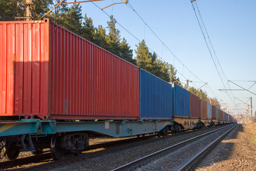 Cargo containers transportation on freight train by railway. Coronavirus Wreaks Havoc On Global...