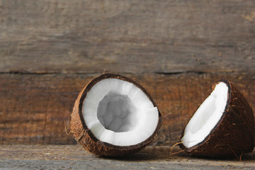Coconut on a wooden background. Chopped coconut
