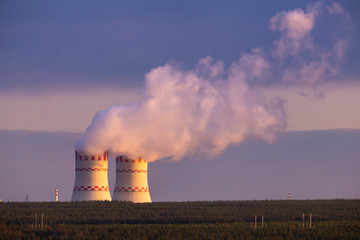 Cooling towers of a nuclear power plant in the light of the sun