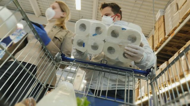 Family buys toilet paper during coronavirus epidemic