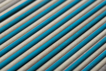 Obraz premium Electrodes for welding. Colorful Welding Sticks Electrodes Background