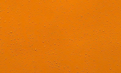 close-up water drop orange background