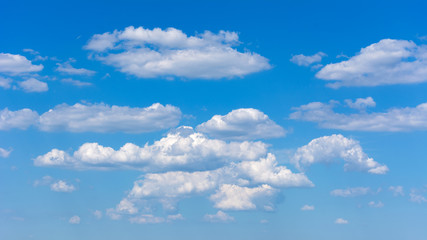 natural background white and fluffy cumulus clouds