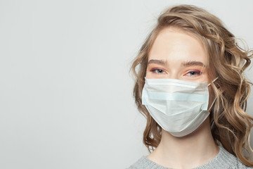 Happy woman in face mask on white background, female face close up