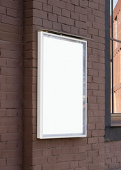 Blank white glass rectangular poster mockup brick wall mounted