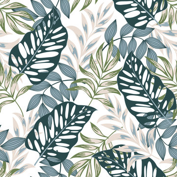 Botanical seamless tropical pattern with bright plants and flowers on a delicate background. Seamless exotic pattern with tropical plants. Exotic jungle wallpaper.