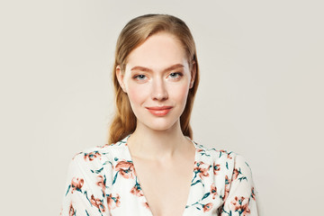 Beauty portrait of young nice woman on white