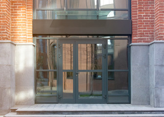 Blank black rectangular box store entrance mockup, glass brick wall