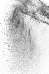 Black particles explosion isolated on white background.  Abstract dust overlay texture.