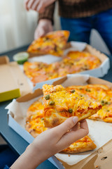 boy and girl share a pizza