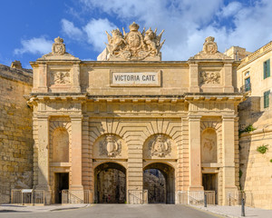 Fototapeta na wymiar The Victoria Gate in Valletta,Malta was built by the British in 1855. It is the main entrance into the city from the Grand Harbour area.