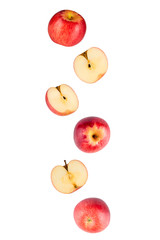 Falling red apples isolated on a white background with clipping path. Flying food