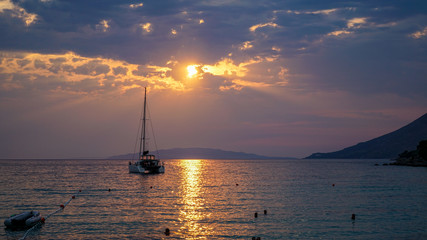 Fototapeta na wymiar Quiet warm evening. Beautiful sunset on the Adriatic