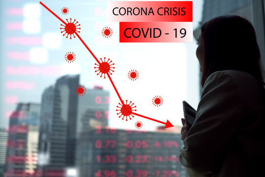 Businesswomen ceo manager is looking Capital City Building view.Red line and Number index stock down Lowest around the worldwide global effect COVID19 Corona virus disease Pandemic spread