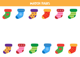 Match pairs of colorful socks. Educational worksheet for preschool kids