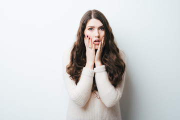 beautiful long-haired girl scared