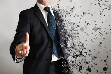 Businessman touches a virtual screen dissolve