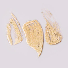 Golden paint texture. Macro view.