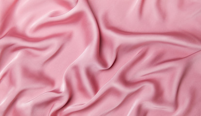 Obraz premium Pink silk fabric background texture. Top view, flat lay.