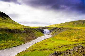 Fototapeta na wymiar Beautiful pristine Iceland waterfall 