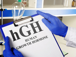 Doctor shows hGH Human growth hormone sign.