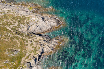 Aerial drone top-down photo of Costa Brava coast and crystal clear waters