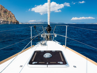 Fototapeta premium sea view from white deck of yacht in summer day