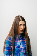 Fototapeta premium portrait of a young woman showing his tongue