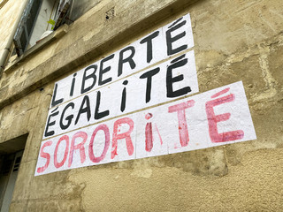 Protest poster pasted by members of a feminist movement saying "Liberty, Equality, Sorority" in Bordeaux, France