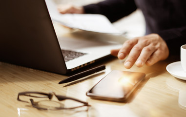 Close-up photo of male hands with smartphone