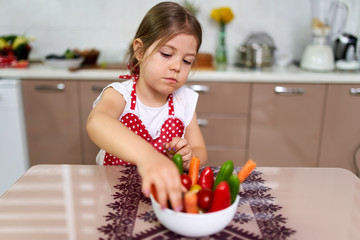Young girl with vegetables