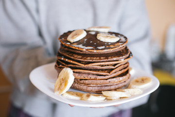 Choolate pancakes with bananas