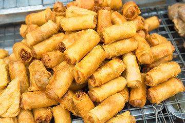 Delicious of traditional asian cuisine. Hot fried snacks at street market