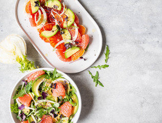 Flat lay various fennel salads with citruses on the table. top view