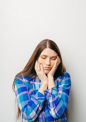 Sleepy or drowsy young woman