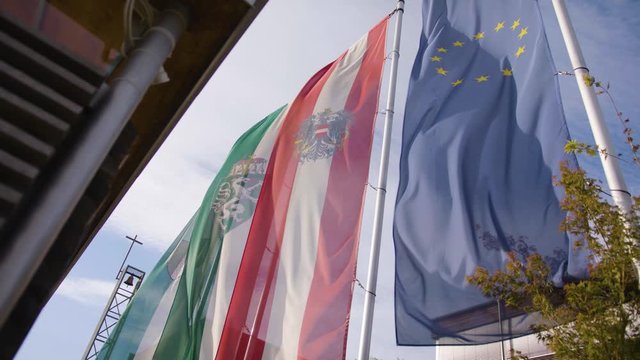 Waving flags (Styria, Austria, European Union)